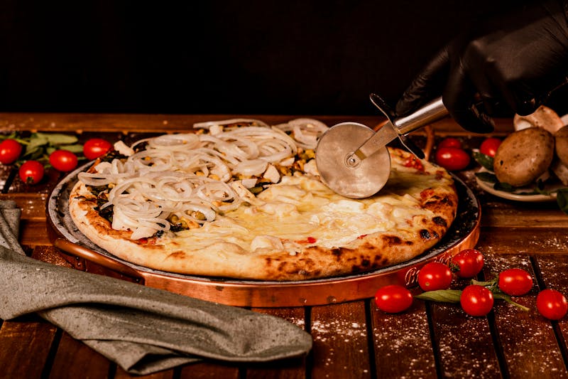 Prosciutto and arugula pizza